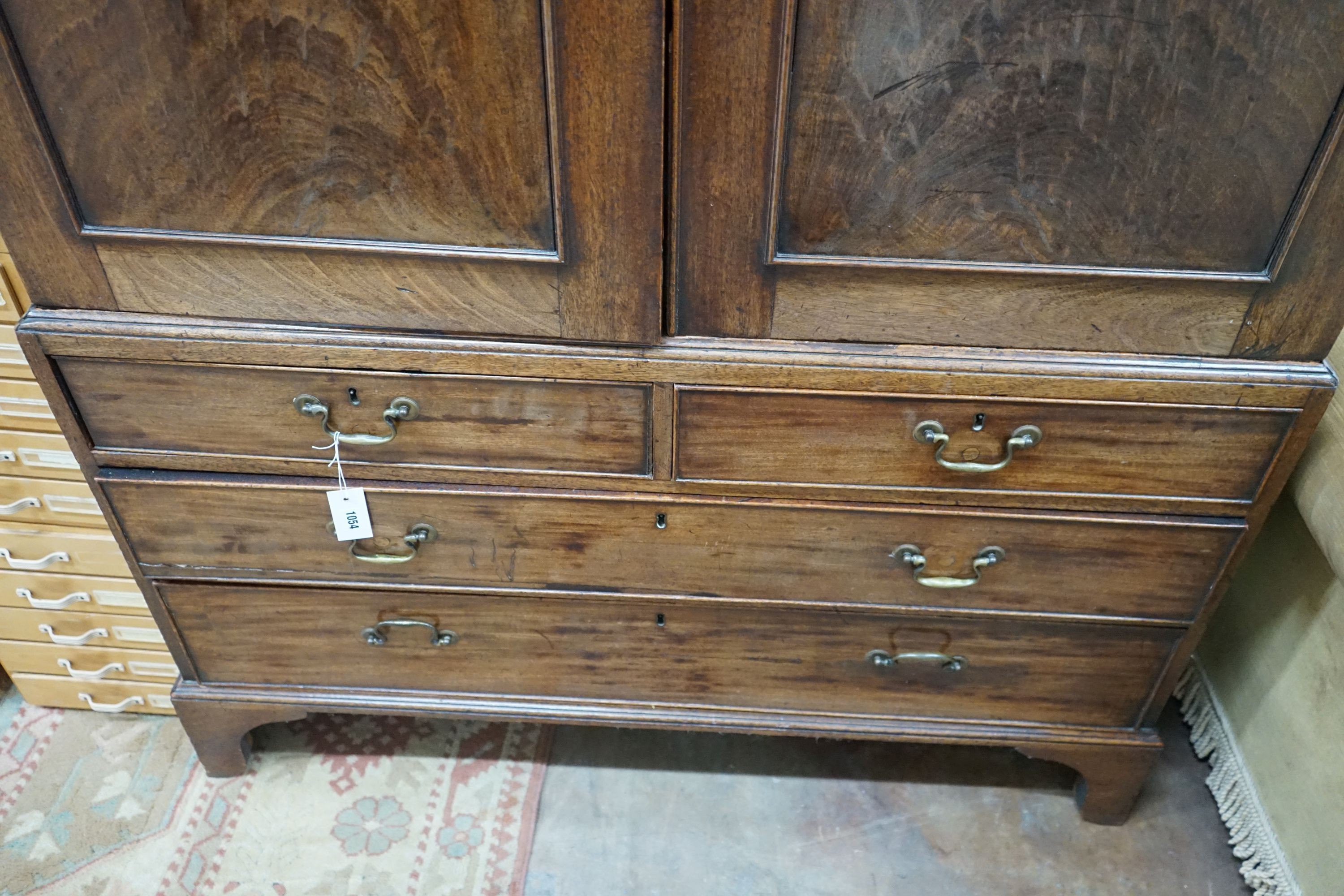 A George III mahogany linen press, width 126cm, depth 56cm, height 197cm